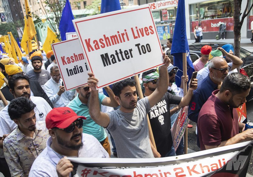 Kashmiris and pro Khalistan Sikhs demonstrate during a march and rally to protest Indian Prime Minister Narendra Modi's decision to strip Kashmir of its special status and the continuous occupation of Punjab, Thursday, Aug. 15, 2019, in New York. Modi on Thursday used an Independence Day speech to defend his decision to strip Kashmir of its special status as about 7 million residents of the disputed region endured an unprecedented security lockdown and communications blackout for an 11th day. (AP Photo/Mary Altaffer)